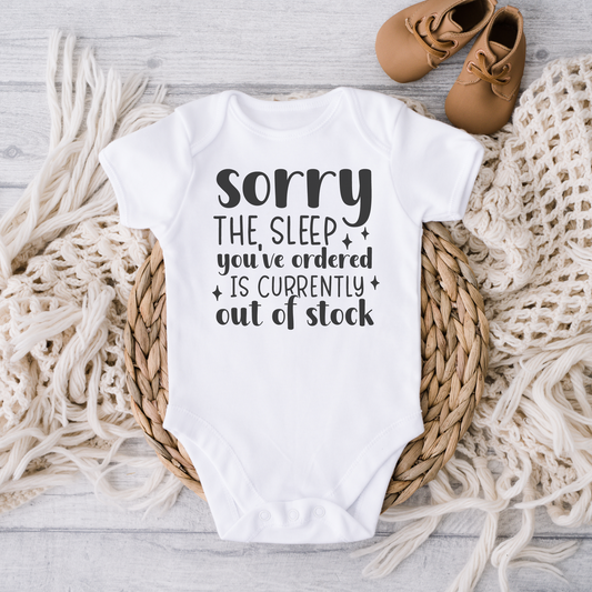 Newborn White Bodysuit with funny saying "Sorry the sleep you've ordered is currently out of stock"